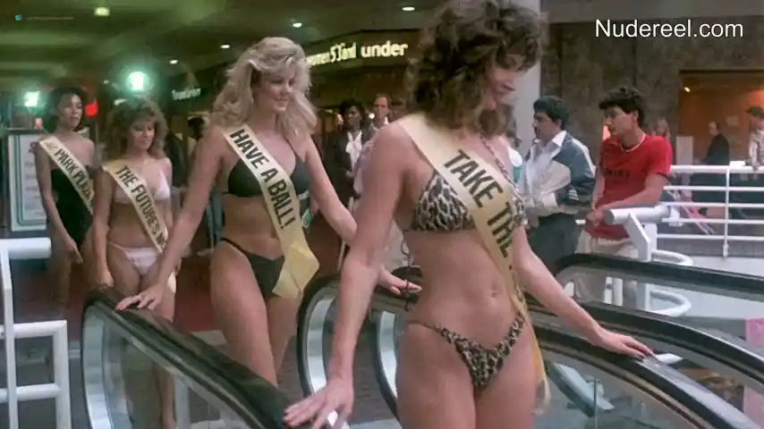 Barbara Crampton, Suzee Slater, Karrie Emerson in Chopping Mall (1986) Scene